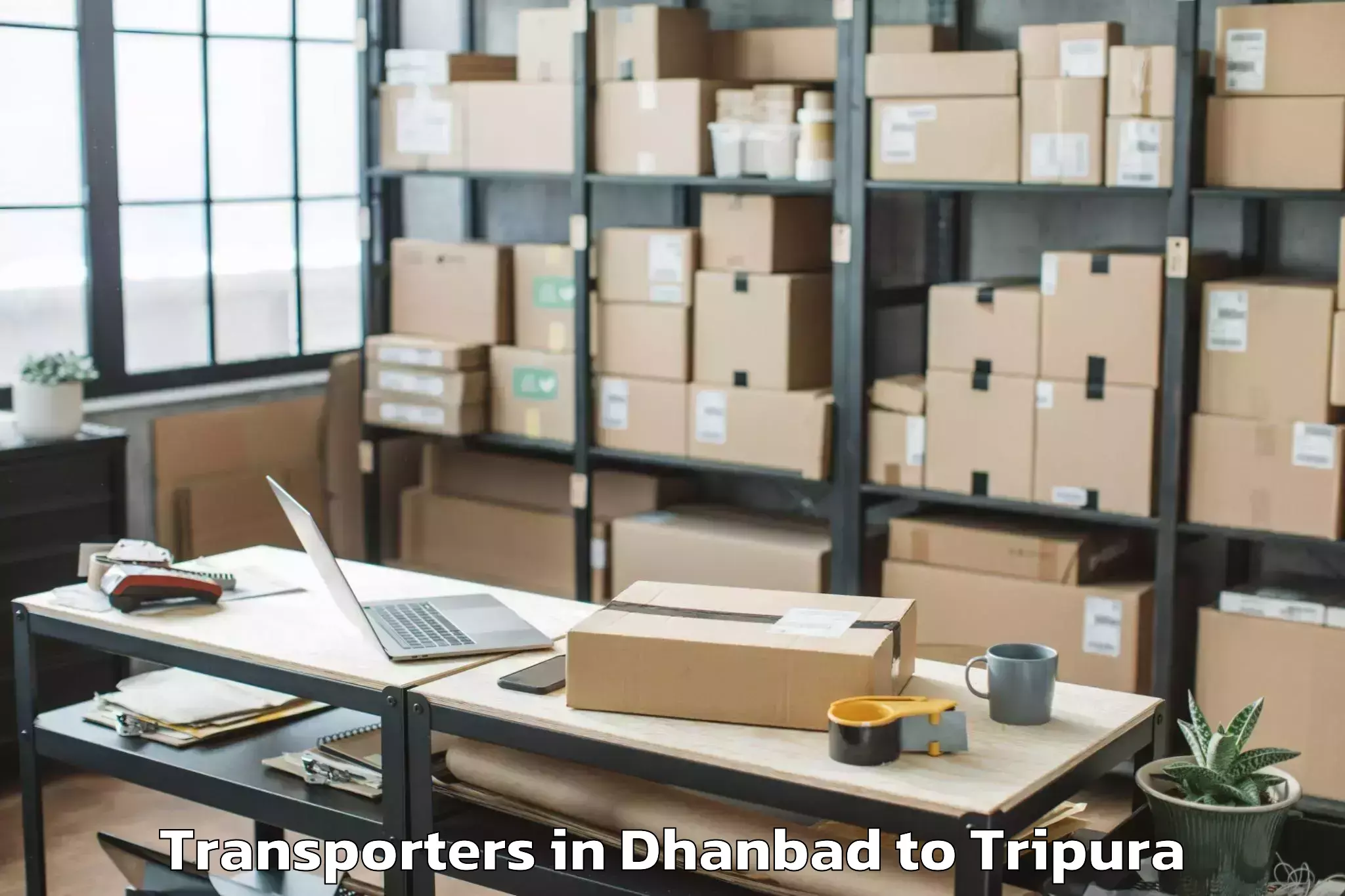 Dhanbad to Manughat Transporters Booking